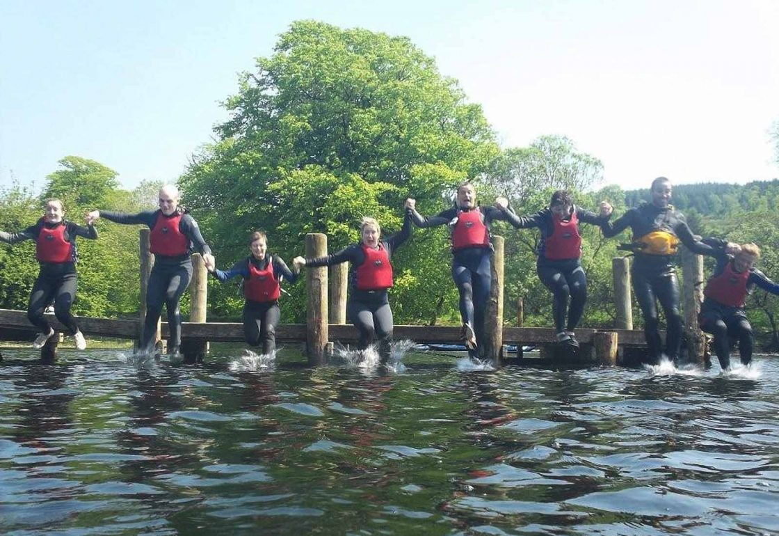 An image of a group of young people jumping into water and taking part a Climbing Out activity , a charity supported by the Ellis Campbell Foundation, helping disadvantaged young people in Hampshire, London and Perthshire