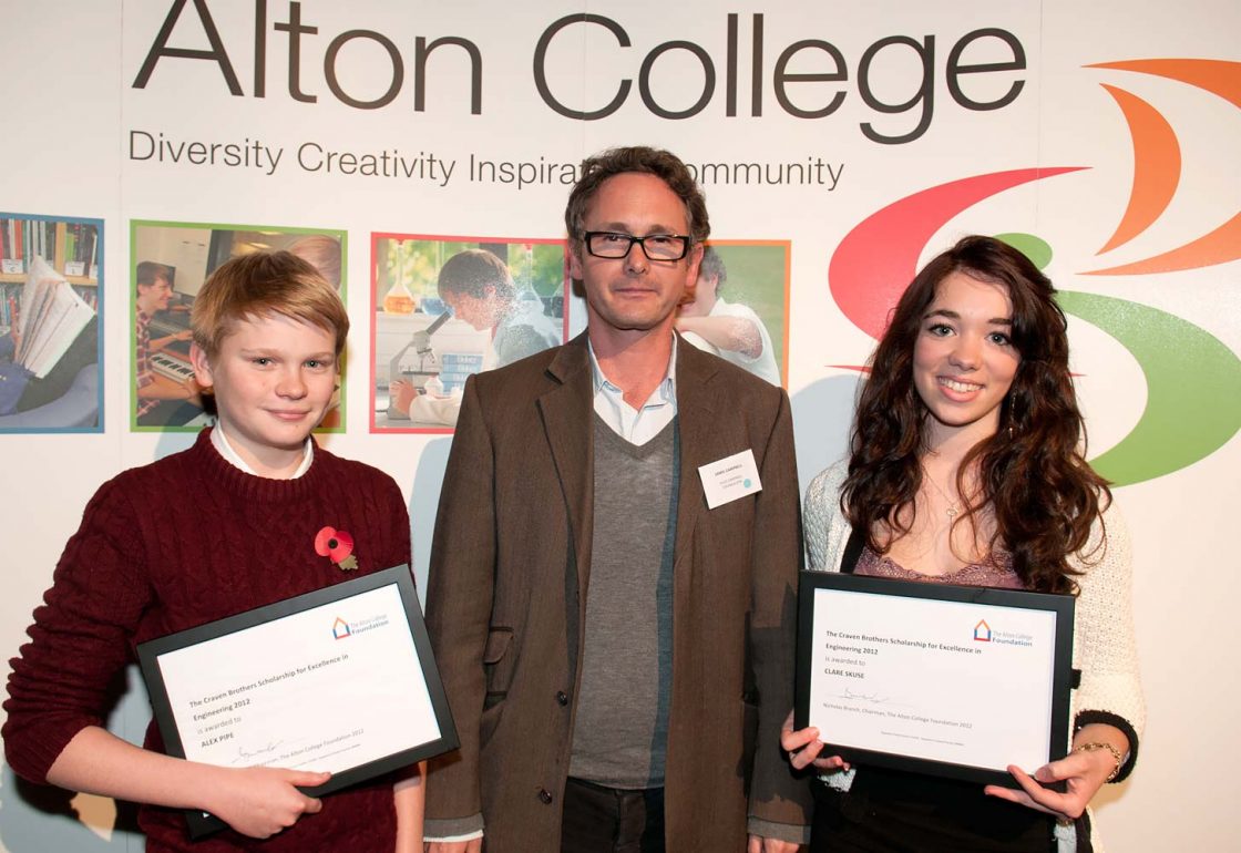 An image of Jamie Campbell presenting two scholars from Alton College with the Craven Brothers Scholarships Alex Pipe and Clara Skuse - An Ellis Campbell Foundation charitable grant in Hampshire