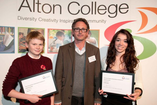 An image of Jamie Campbell presenting two scholars from Alton College with the Craven Brothers Scholarships Alex Pipe and Clara Skuse - An Ellis Campbell Foundation charitable grant in Hampshire
