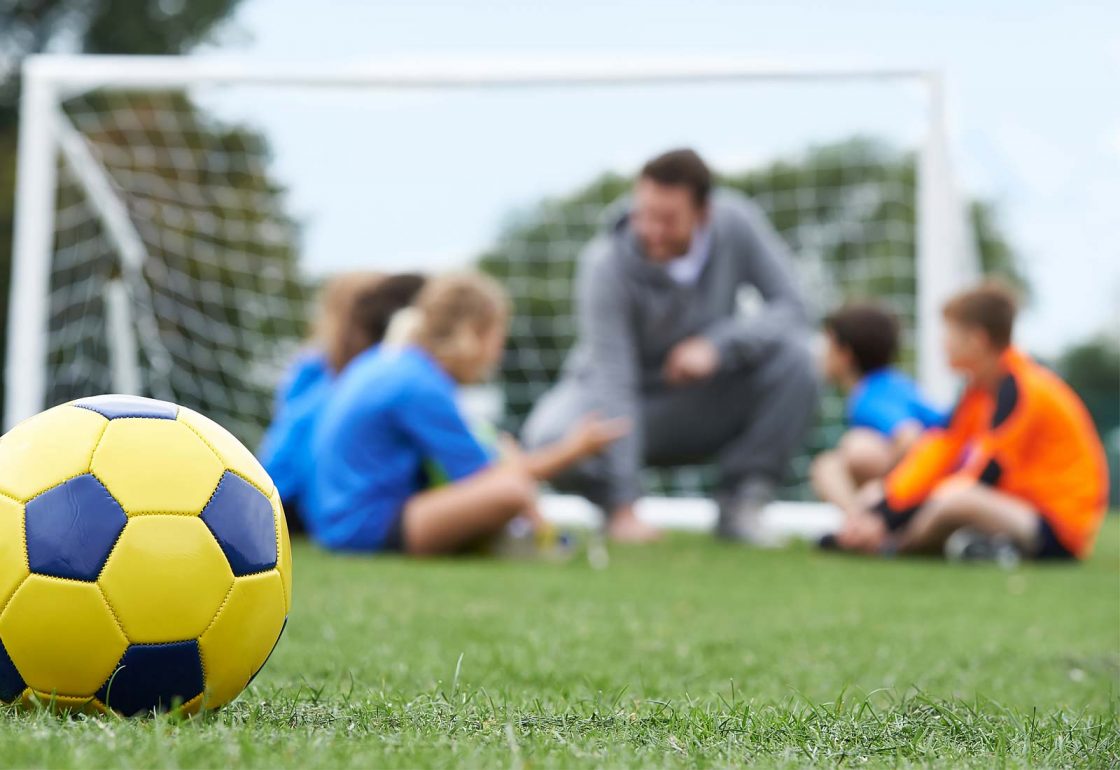 In image of children being coached at football as part of the Kick London Sports Programme, a charity supported by the Ellis Campbell Foundation, helping disadvantaged young people in Hampshire, London and Perthshire