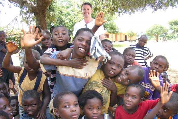 An image of Jamie Campbell and a group of young people at Makangwe Community School, a build It International project supported by the Ellis Campbell Foundation, helping disadvantaged young people in Hampshire, London and Perthshire