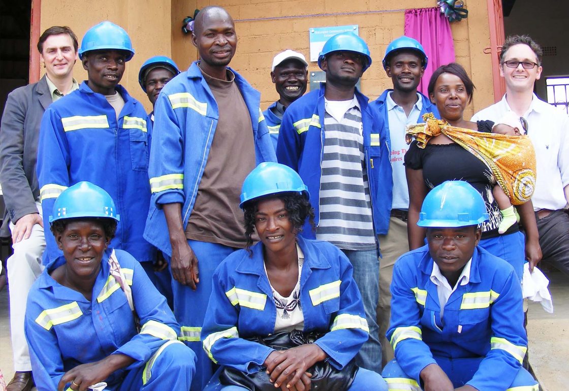 An image of Jamie Campbell and a group of construction workers at Makangwe Community School, a build It International project supported by the Ellis Campbell Foundation, helping disadvantaged young people in Hampshire, London and Perthshire