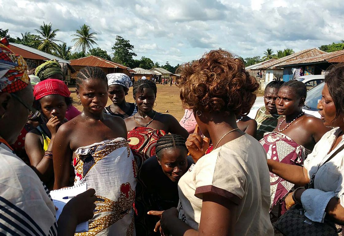 An image of African women in a rural community in Sierra Leone partaking in a sensitisation campaign, a cause supported by the Ellis Campbell Foundation, helping disadvantaged young people in Hampshire, London and Perthshire