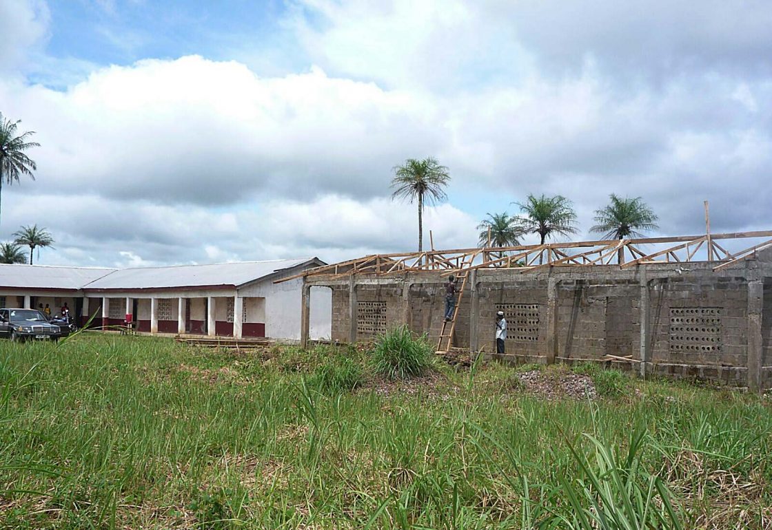 An image of a rural community in Sierra Leone partaking in a sensitisation campaign, a cause supported by the Ellis Campbell Foundation, helping disadvantaged young people in Hampshire, London and Perthshire