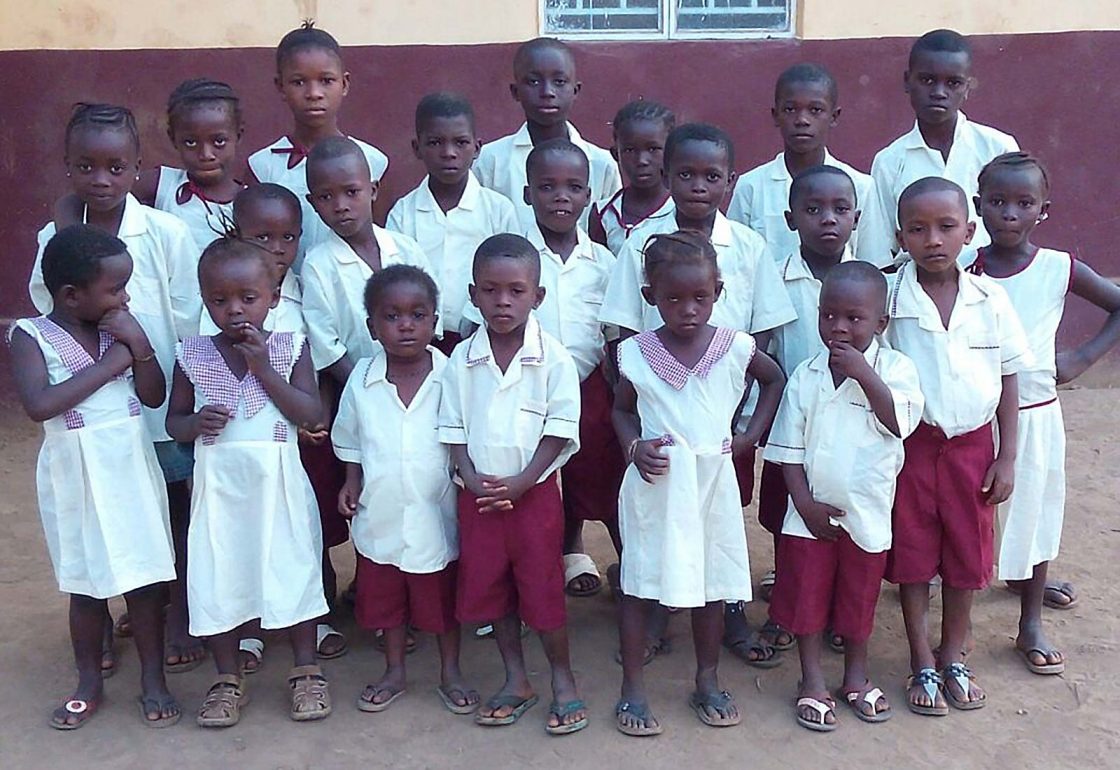 An image of a group of school children in a rural community in Sierra Leone partaking in a sensitisation campaign, a cause supported by the Ellis Campbell Foundation, helping disadvantaged young people in Hampshire, London and Perthshire
