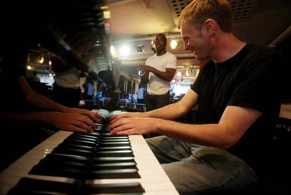 An image of a guy playing the piano representing Finding Rhythms Music Programme for Prisoners a grant by the Ellis Campbell Foundation helping disadvantaged young people in Hampshire, London and Perthshire