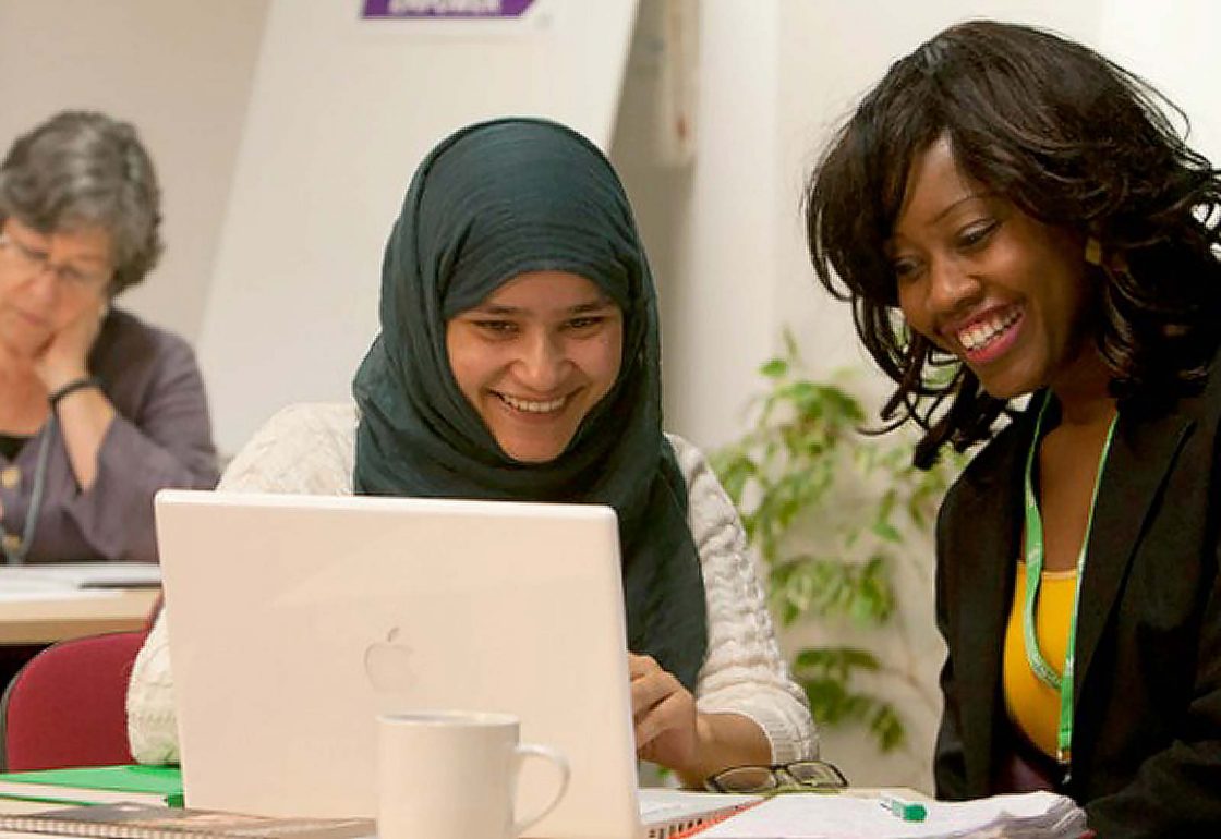 An image of a young smiling girl receiving educational support and representing the School Home Support Grant made by the Ellis Campbell Foundation helping disadvantaged young people in Hampshire, London and Perthshire