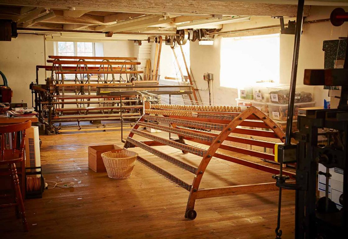 An image of an empty silk loom representing the Whitchurch Silk Mill Apprenticeship Grant made by the Ellis Campbell Foundation helping disadvantaged young people in Hampshire, London and Perthshire