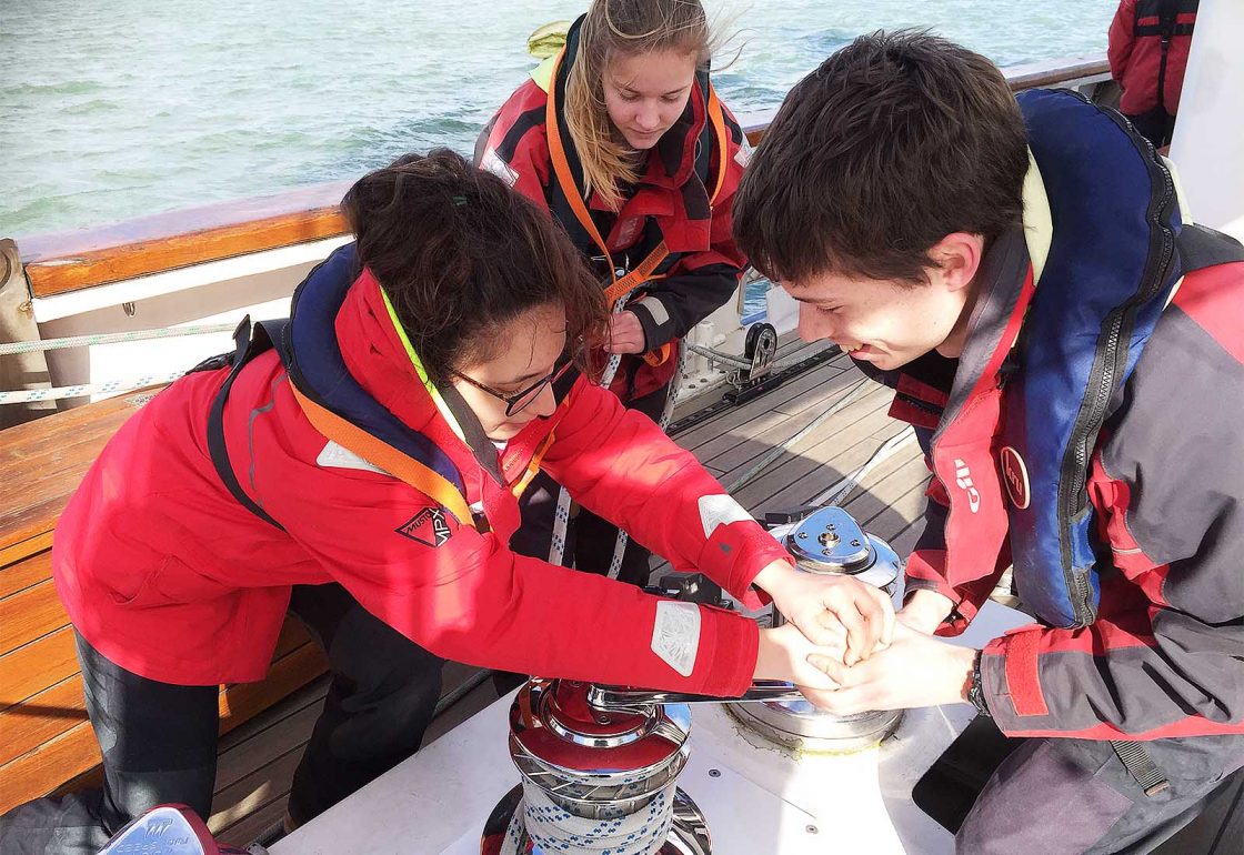 An image of a group of young people aboard the sailing boat Prolific part of Ocean Youth Trust South, a charity supported by the Ellis Campbell Foundation, helping disadvantaged young people in Hampshire, London and Perthshire