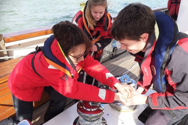 An image of a group of young people aboard the sailing boat Prolific part of Ocean Youth Trust South, a charity supported by the Ellis Campbell Foundation, helping disadvantaged young people in Hampshire, London and Perthshire