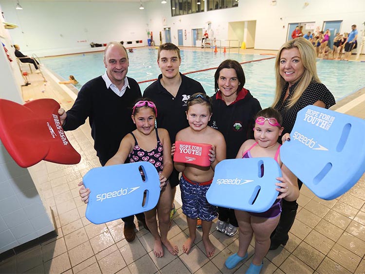 A colour image of children swimming and taking part in a Hope for Youth NI event, a charity supported by The Ellis Campbell Foundation
