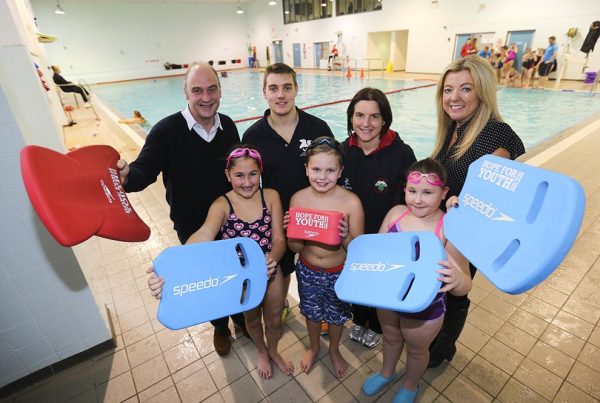 A colour image of children swimming and taking part in a Hope for Youth NI event, a charity supported by The Ellis Campbell Foundation