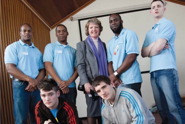 A colour image of young offenders with Penelope Keith taking part in the KeepOut Crime Diversion Scheme - supported by the Ellis Campbell Foundation