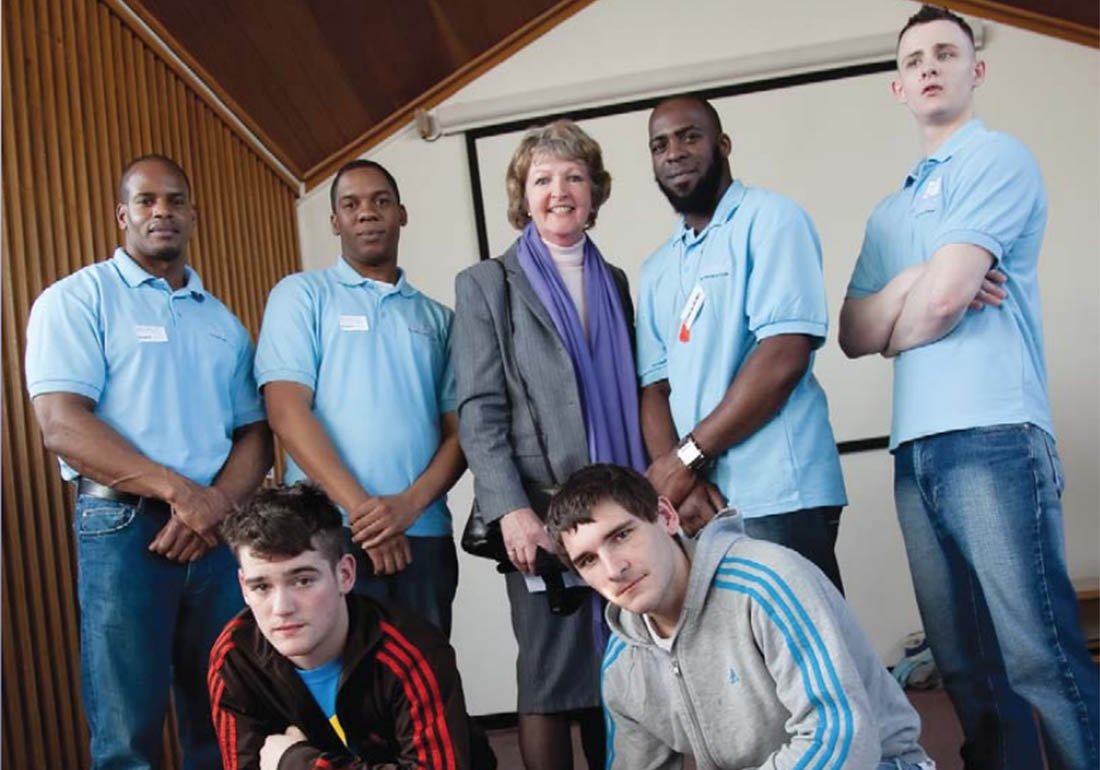 A colour image of young offenders with Penelope Keith taking part in the KeepOut Crime Diversion Scheme - supported by the Ellis Campbell Foundation