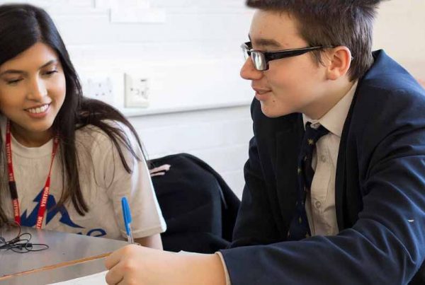 A colour image of a young male being coached and taking part in the Future Frontiers programme a charity supported by the Ellis Campbell Foundation