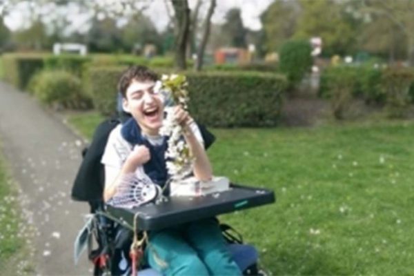 A colour photo of young smiling disabled person part of Parity for Disability programme supported by the Ellis Campbell Foundation