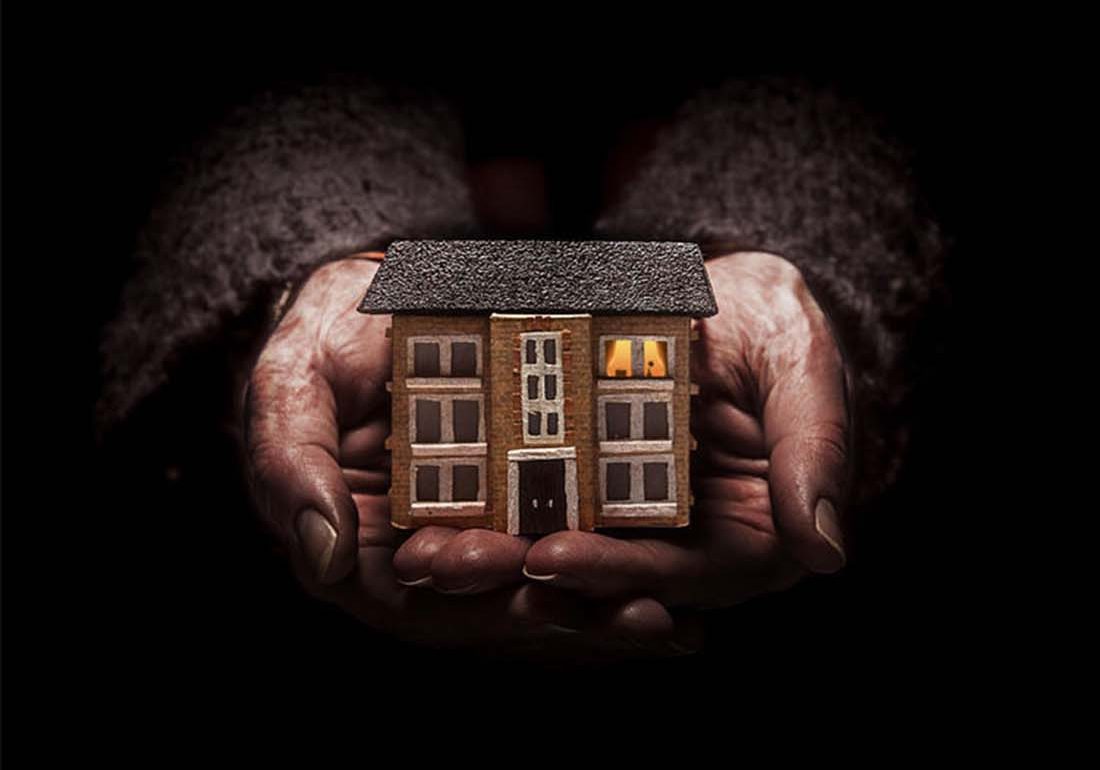 A colour image of hands holding a house used as the advert for Punchdrunk's Small Wonders production supported by The Ellis Campbell Foundation