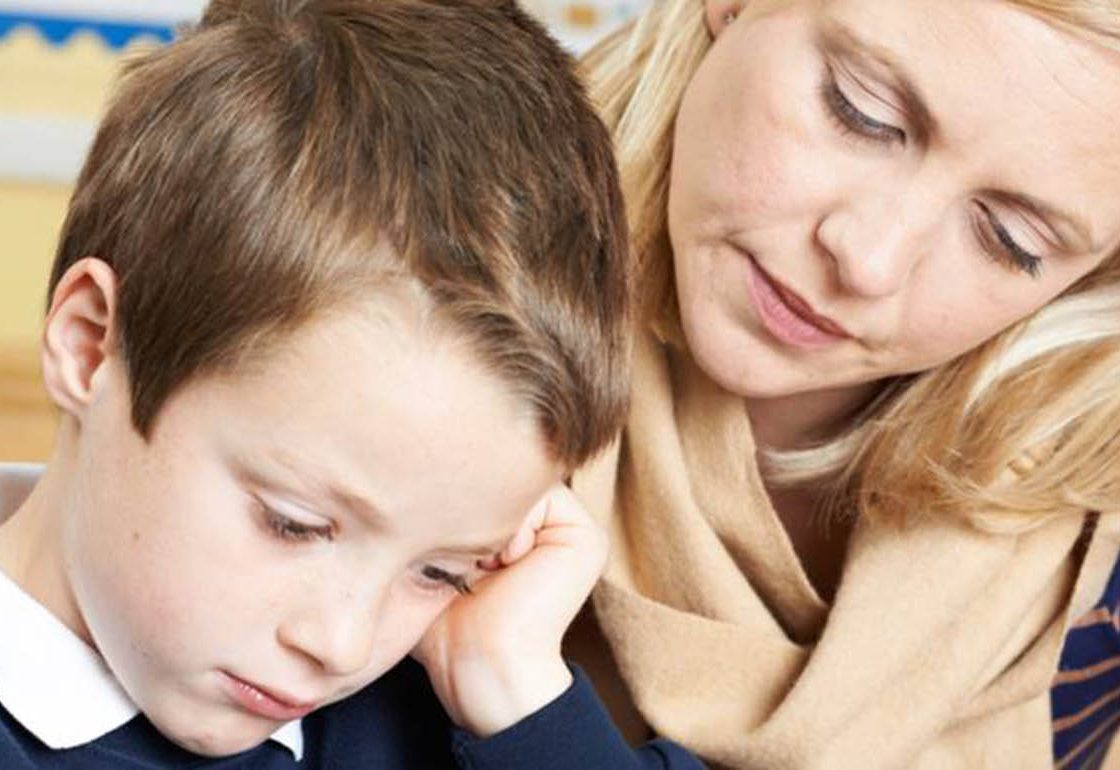 A picture of a lady teaching a young boy as part of the Achievement for All programme supported by The Ellis Campbell Foundation