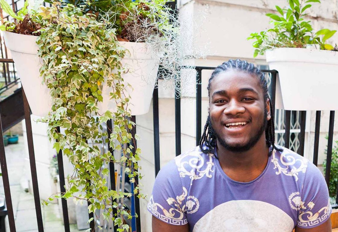 An image of a smiling black male part of the Centrepoint Soho programme supported by The Ellis Campbell Foundation