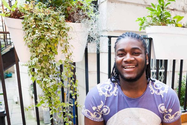 An image of a smiling black male part of the Centrepoint Soho programme supported by The Ellis Campbell Foundation